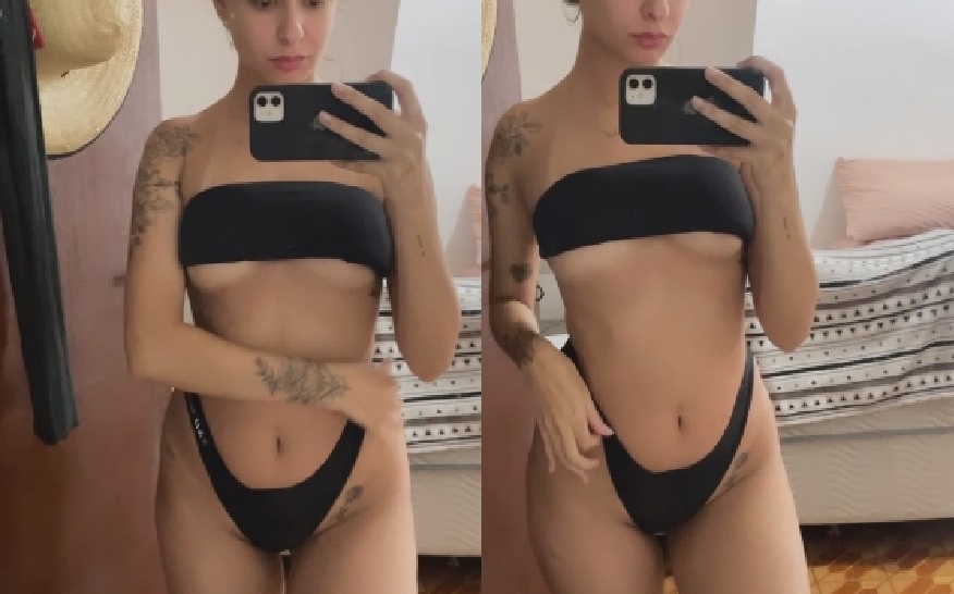 Beatriz Claudino mostrando su lado sensual en el reflejo del espejo en un contenido de Onlyfans