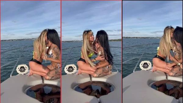 Video casero de Divinskull besando a un amigo de cabello oscuro en la parte delantera del barco